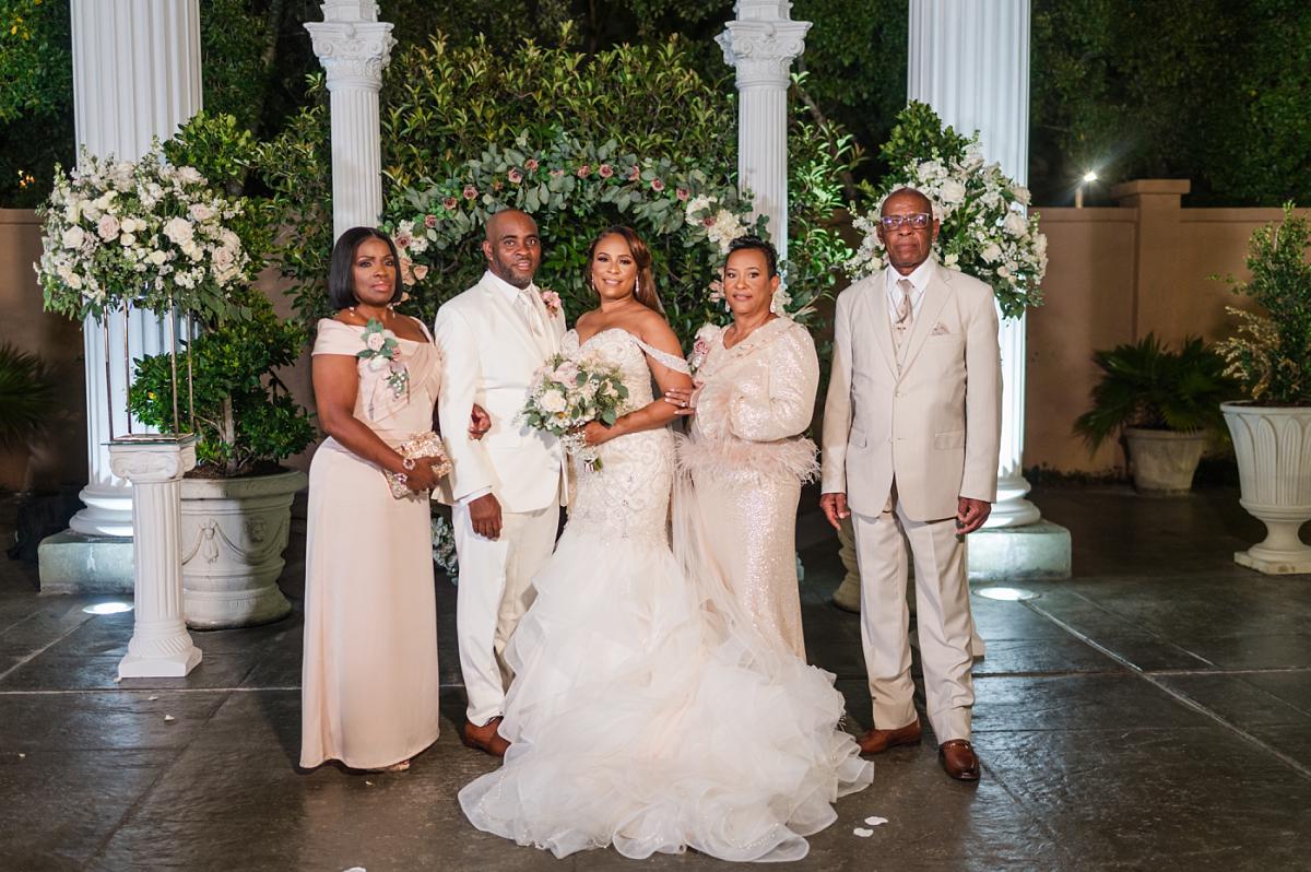 Bride and groom with family at Champagne Palace