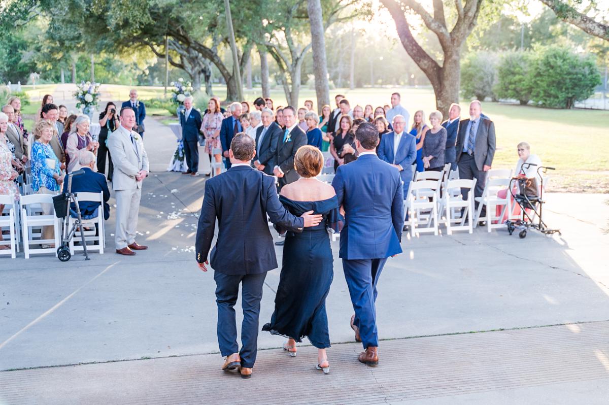 View of the ceremony set up under the oaks at Ellendale Country Club
