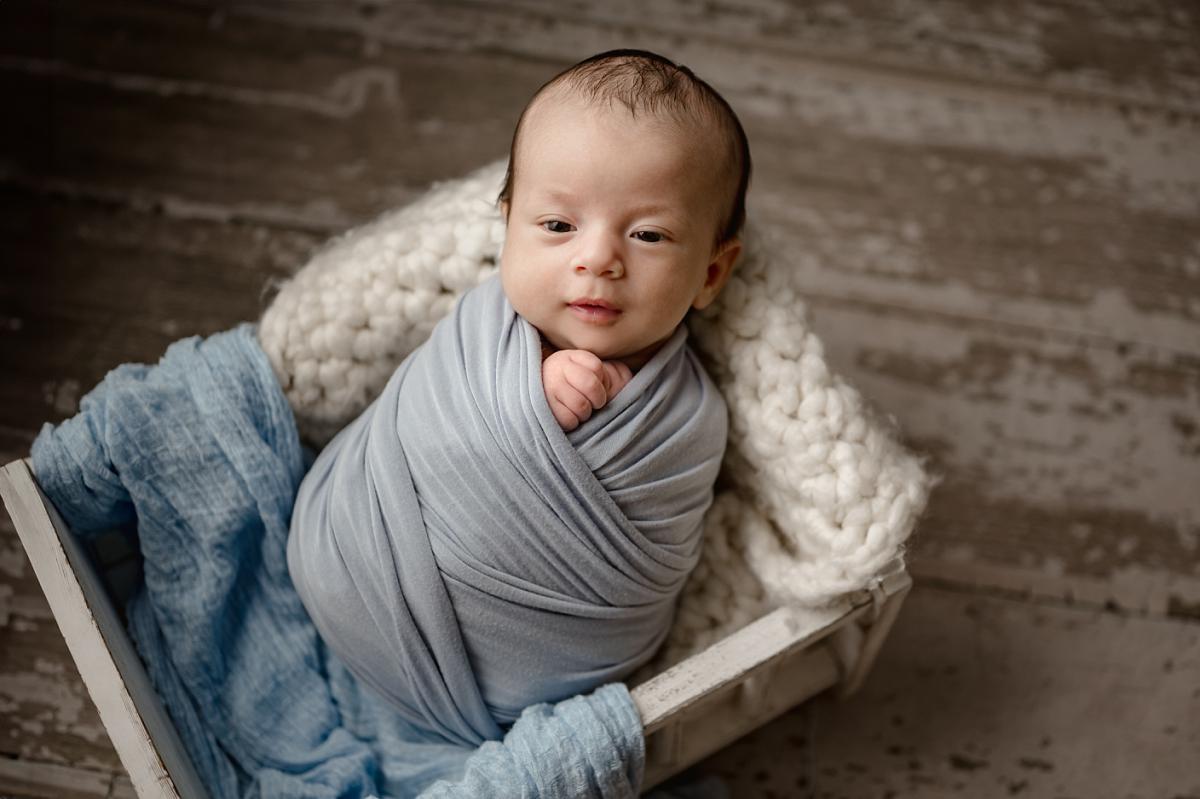 2-month-old baby photographed by Houma newborn photographer during a milestone session