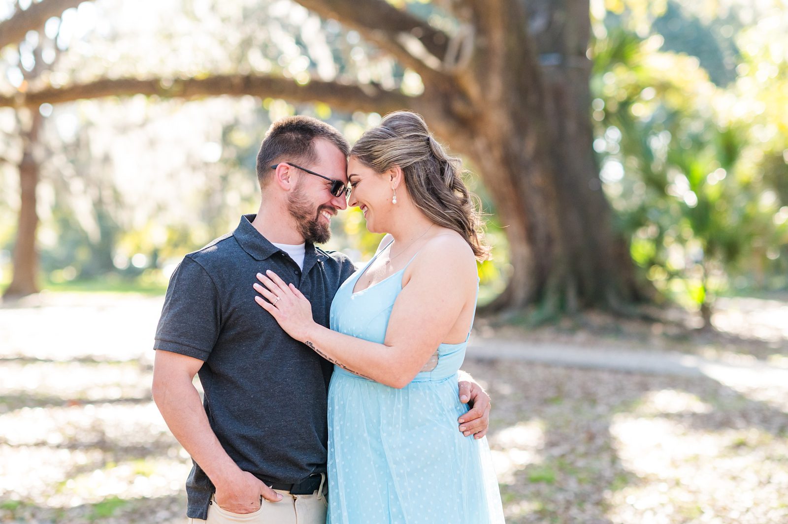 New Orleans engagement photos at City Park with Spanish moss and iconic oak trees