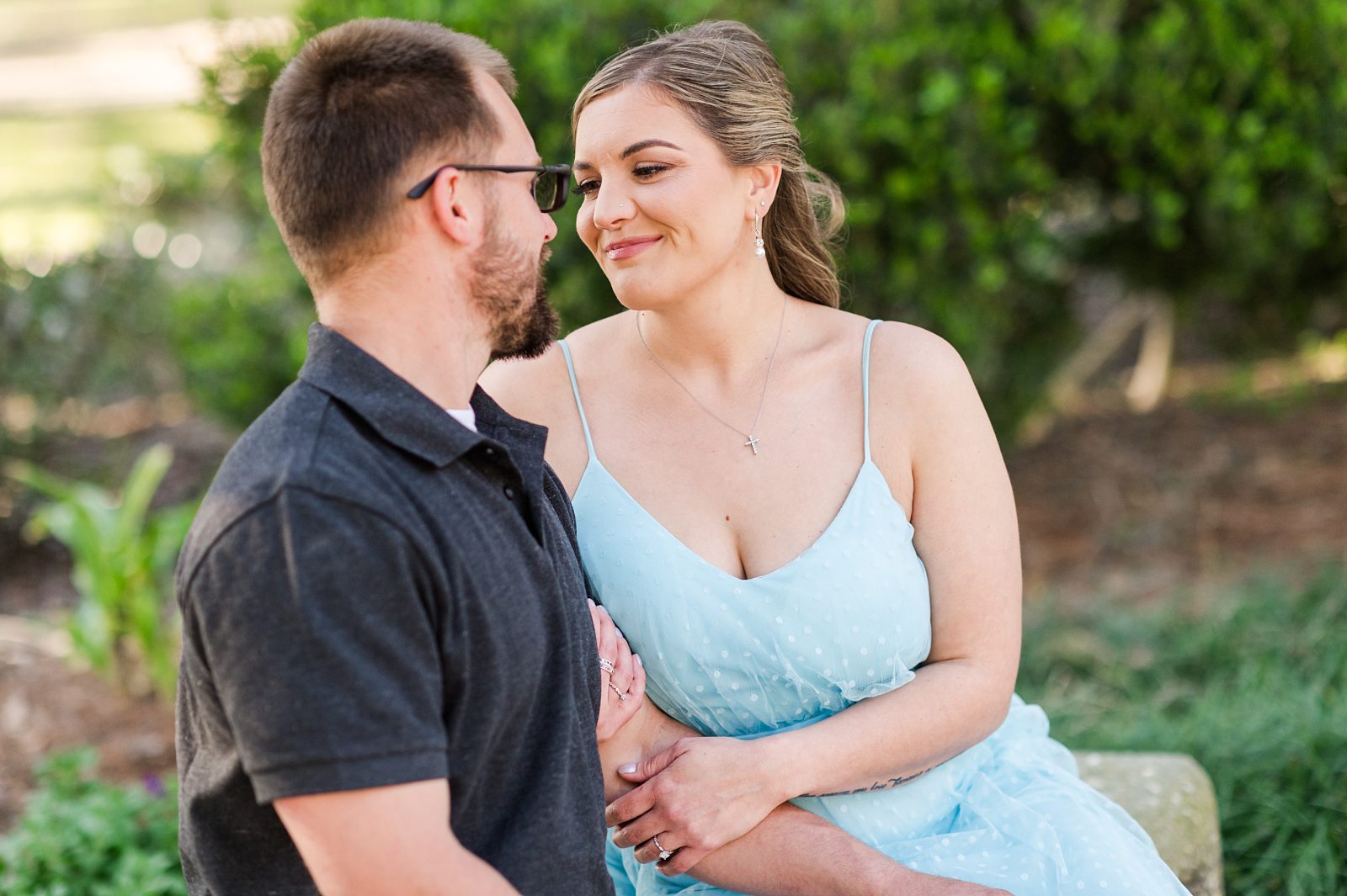 Salena and Trey sharing a sweet moment during their New Orleans engagement session